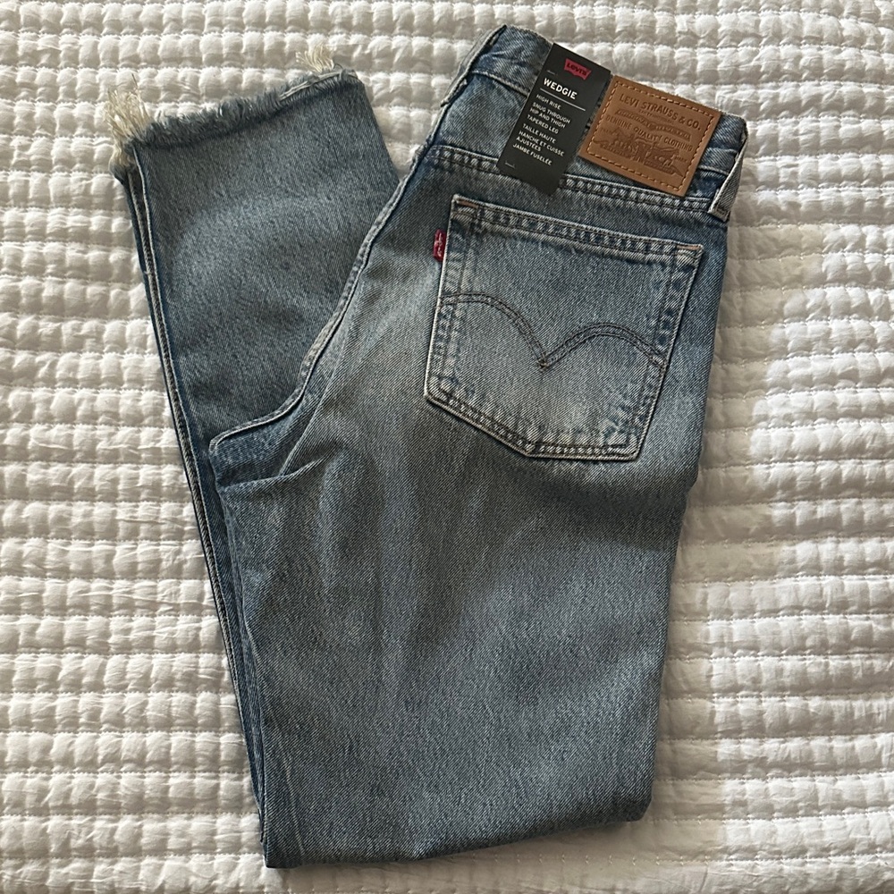 Levi's Wedgie High Rise Tapered Leg Raw Hem Denim Jeans 27